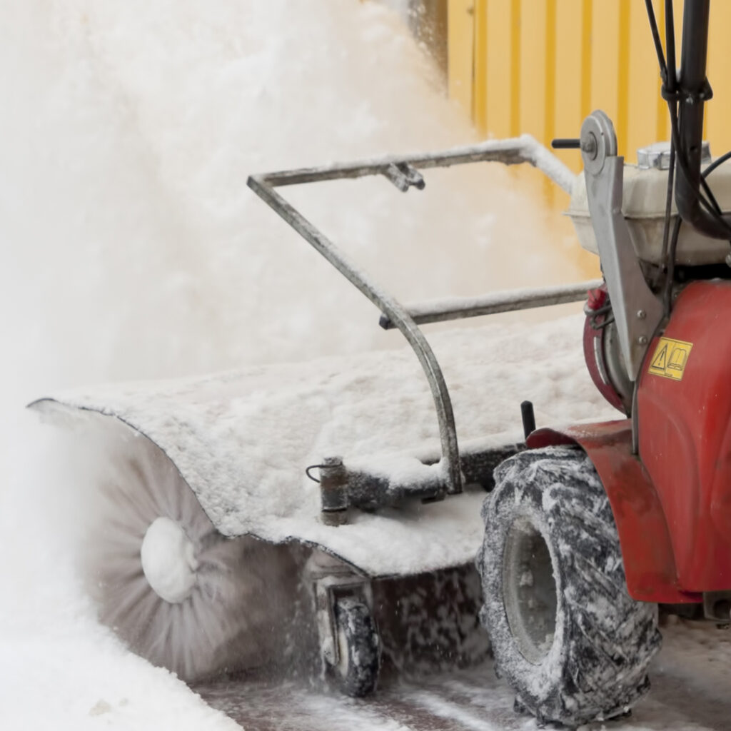 Image of a snow blower pushing through a drift